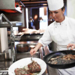 The History of Steakhouse Dining: A Tradition We’re Proud to Continue